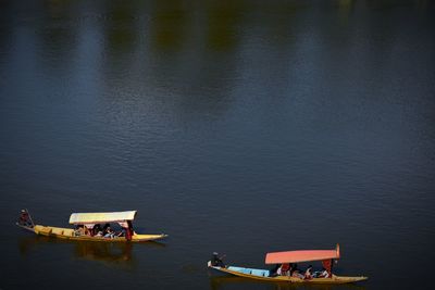 A relaxing shikara ride at sanasar lake, jammu and kashmir.