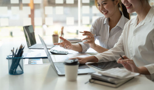 Business colleagues working on table