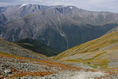 Scenic view of land and mountains