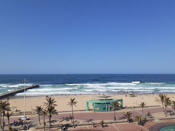 Scenic view of sea against clear blue sky