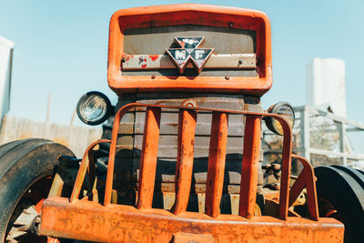 Close-up of old abandoned truck against sky