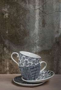 Close-up of coffee cup on table