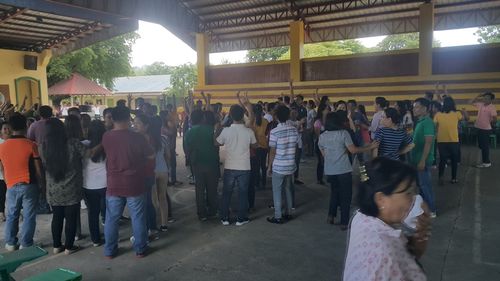 Group of people in front of building