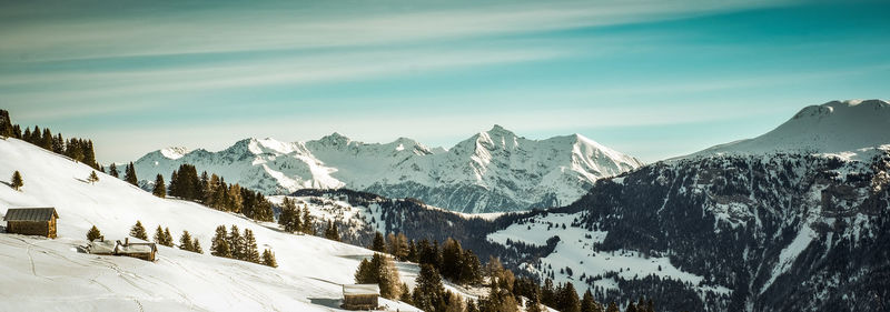 Scenic view of snowcapped mountains against sky