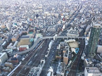 High angle view of street amidst buildings in city