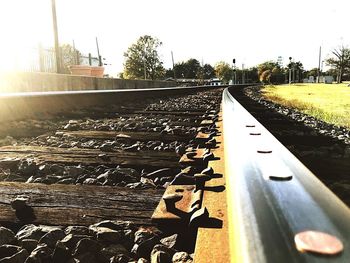 Close-up of railroad track against clear sky