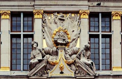 Low angle view of statue, sculpture on a building