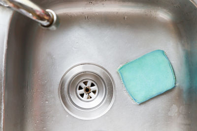 Close-up of faucet in bathroom