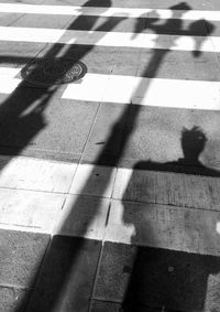 Low section of person on tiled floor