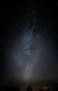 Low angle view of stars in sky at night