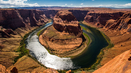 Panoramic view of rock formations against sky