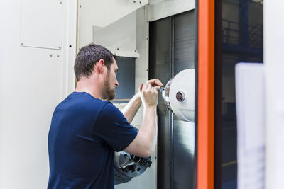 Man working at a machine