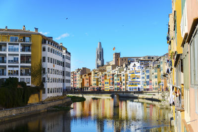 Buildings in city against sky