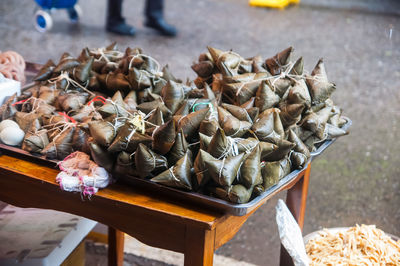 Chinese glutinous rice dumplings zongzi. sticky rice, triangle or cone shaped.