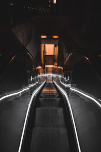 Illuminated light trails on road at night