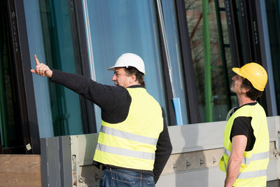 Close-up of men working