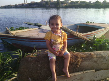 Portrait of smiling boy on boat