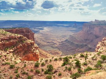 Scenic view of rock formations against sky