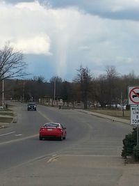 Road against cloudy sky