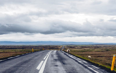 Empty road along landscape