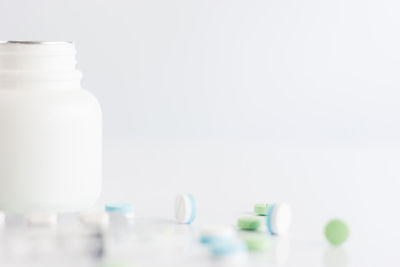 Close-up of bottle against white background