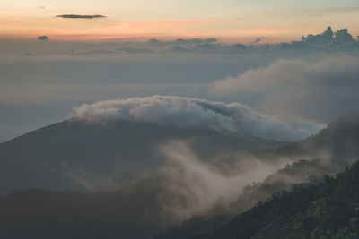 Scenic view of mountains against sky during sunset