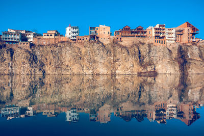 Reflection of buildings in water