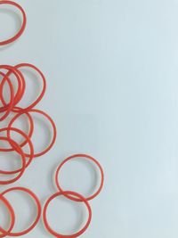 High angle view of red paint on white background