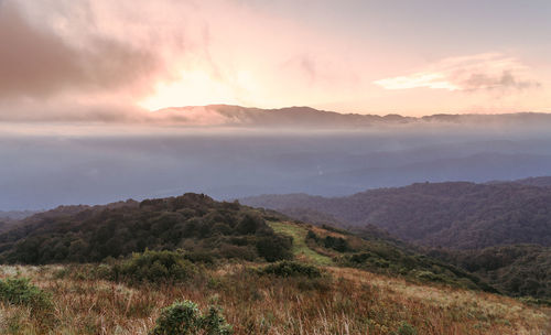 Scenic view of landscape against sky during sunset