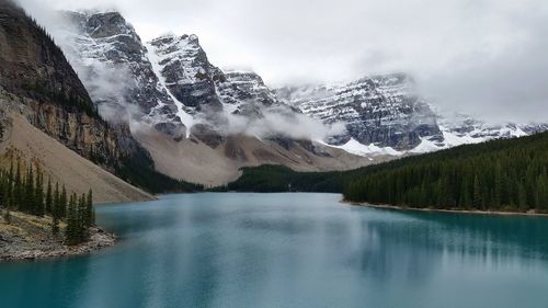 Scenic view of frozen lake against sky