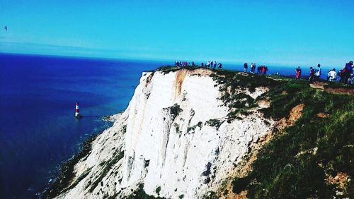 Scenic view of sea against blue sky