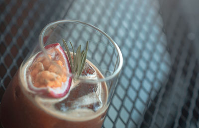 High angle view of drink in glass on table