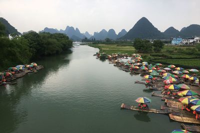 High angle view of nautical vessels in river 