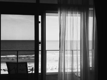 Sea seen through glass window