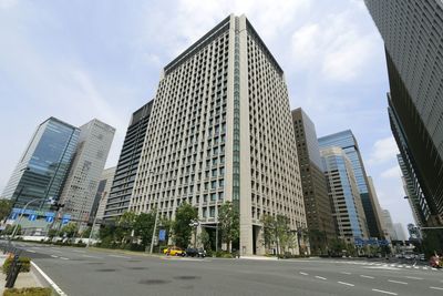 Low angle view of skyscrapers against sky