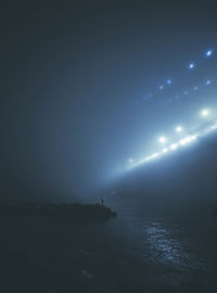 Scenic view of sea against sky at night