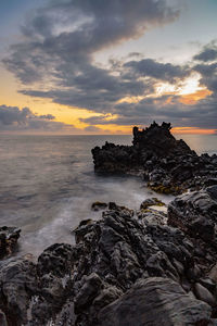 Scenic view of sea against sky during sunset