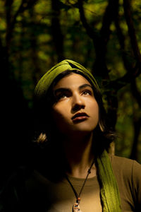 Portrait of young woman wearing hat