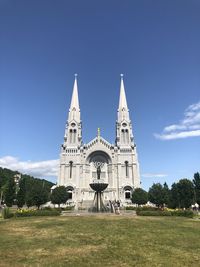 Facade of church against blue sky