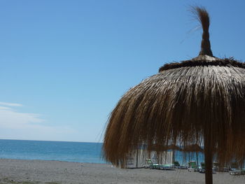 Scenic view of beach against clear sky