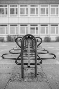 Close-up of bike rack in city