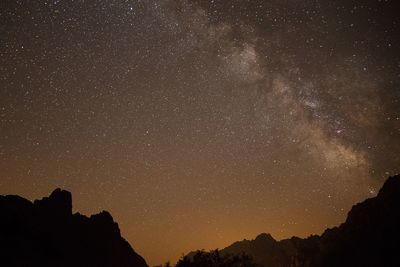 Low angle view of stars against sky at night