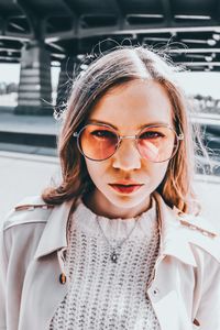 Portrait of young woman wearing sunglasses