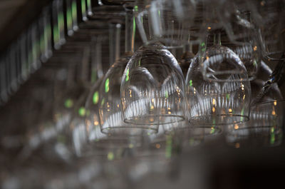 Champagne glasses hanging over the bar