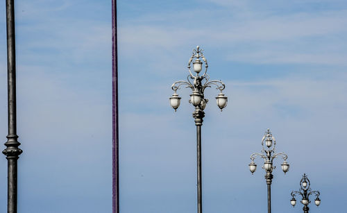 Low angle view of street light against sky