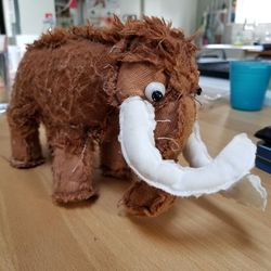 Close-up of stuffed toy on table at home