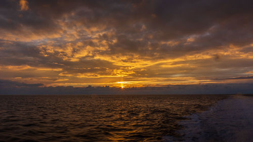 Scenic view of sea against sky during sunset
