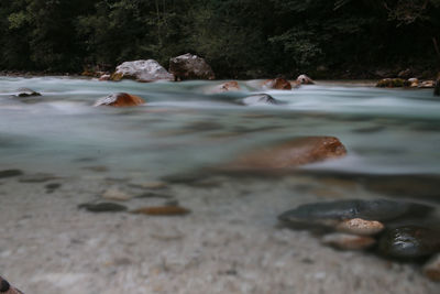 Surface level of stream flowing through rocks