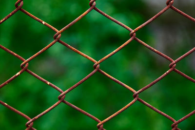 A steel fence which have rust to safety zone