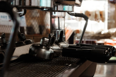 Close-up of coffee machine at cafe